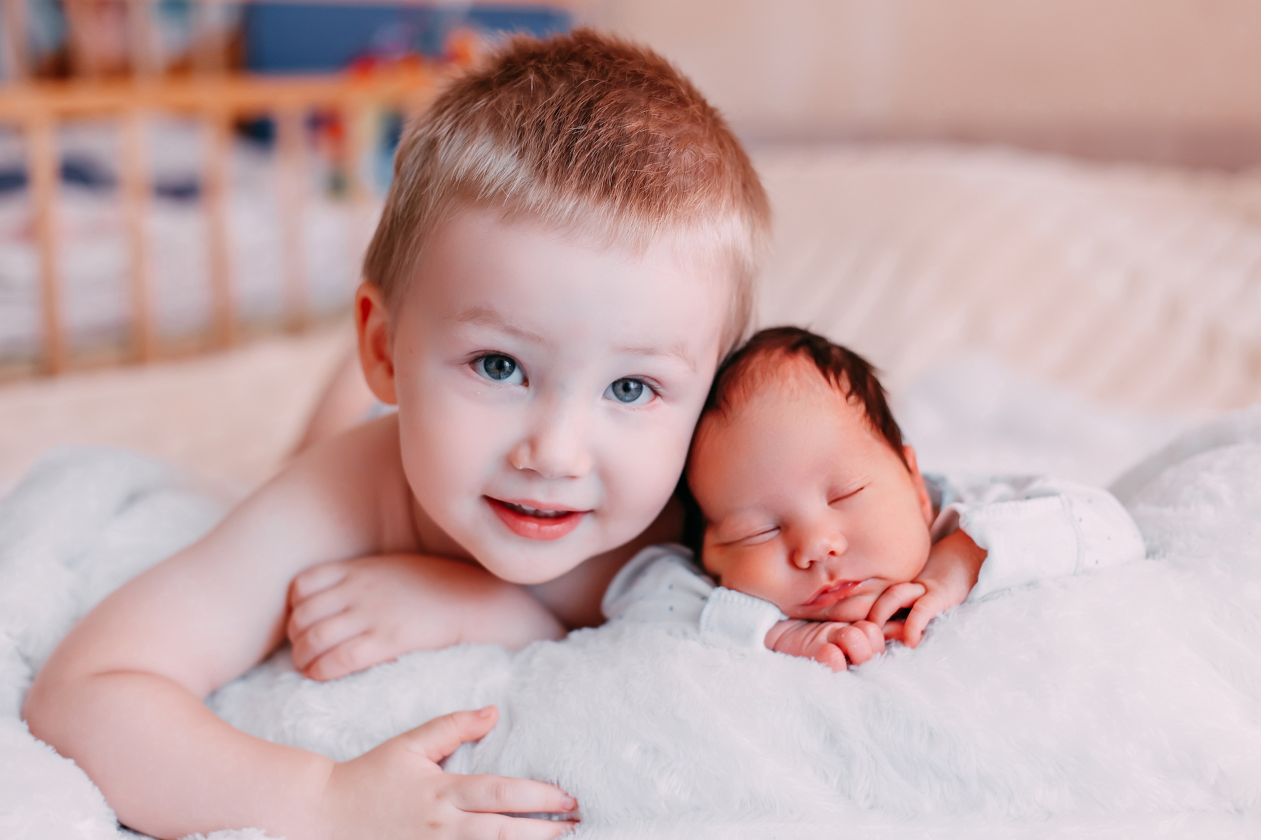 Young child and newborn.